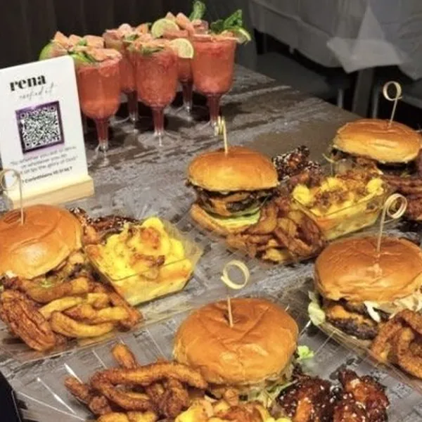 Burger and mocktail spread at an event