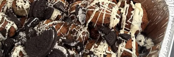 Chocolate desserts drizzled with white chocolate