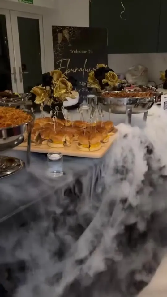 A styled luxury buffet with dry-ice mist